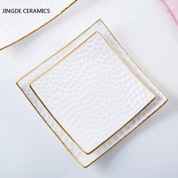 54446-062cd2.jpg Assiette à gâteau en céramique dorée