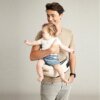 Porte bébé à la taille qui s'attache comme une ceinture et est réglable