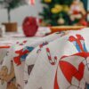 83003-ae41ce.jpg Nappe de Noël lavable pour fête – Rouge décor de Noël